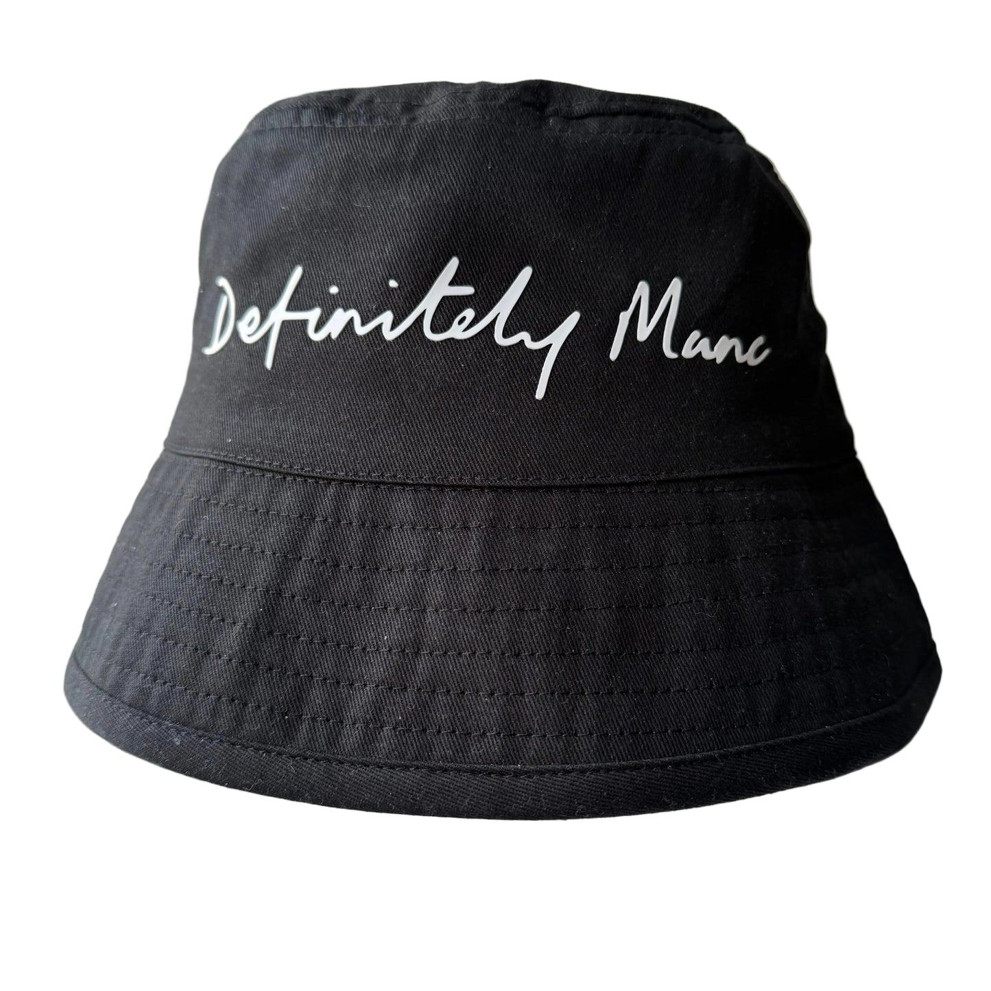 Black bucket hat with 'Definitely Manc' text on a white background