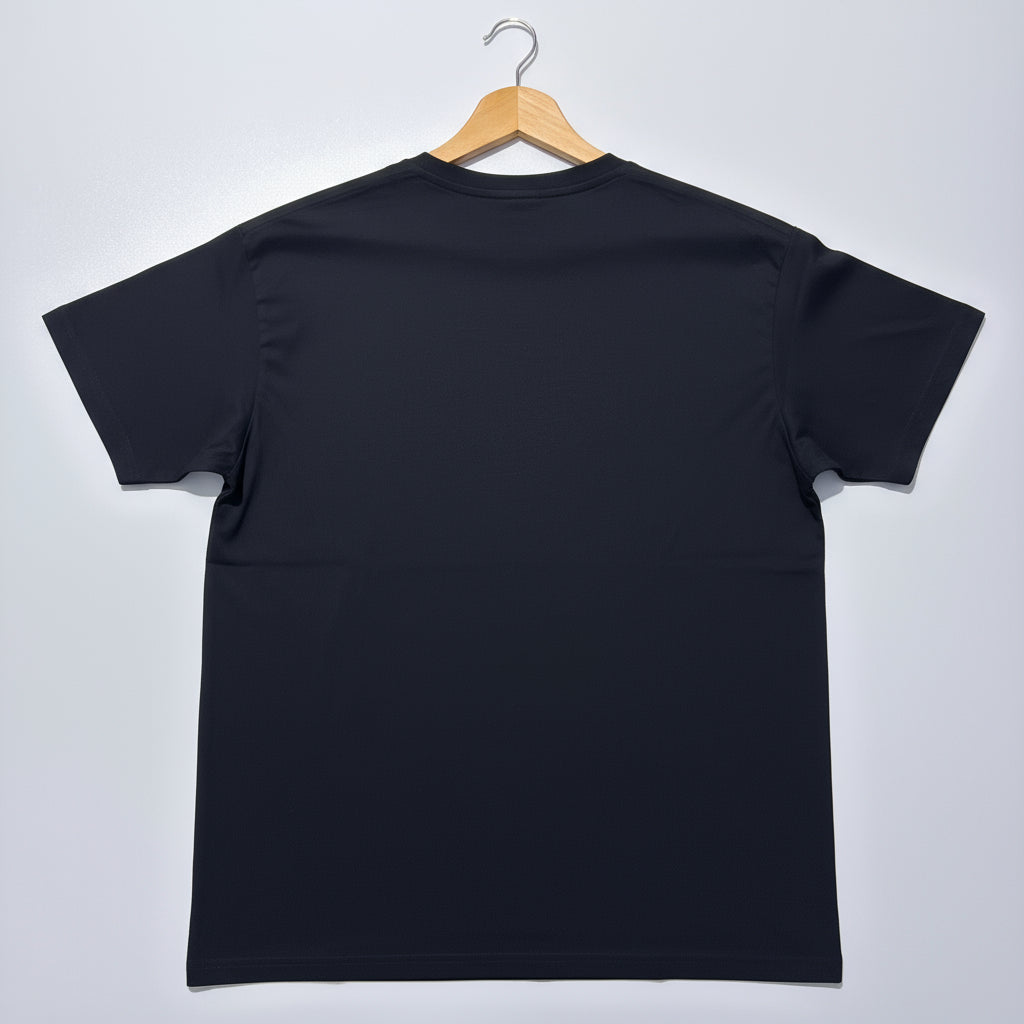 black t-shirt against a white backdrop