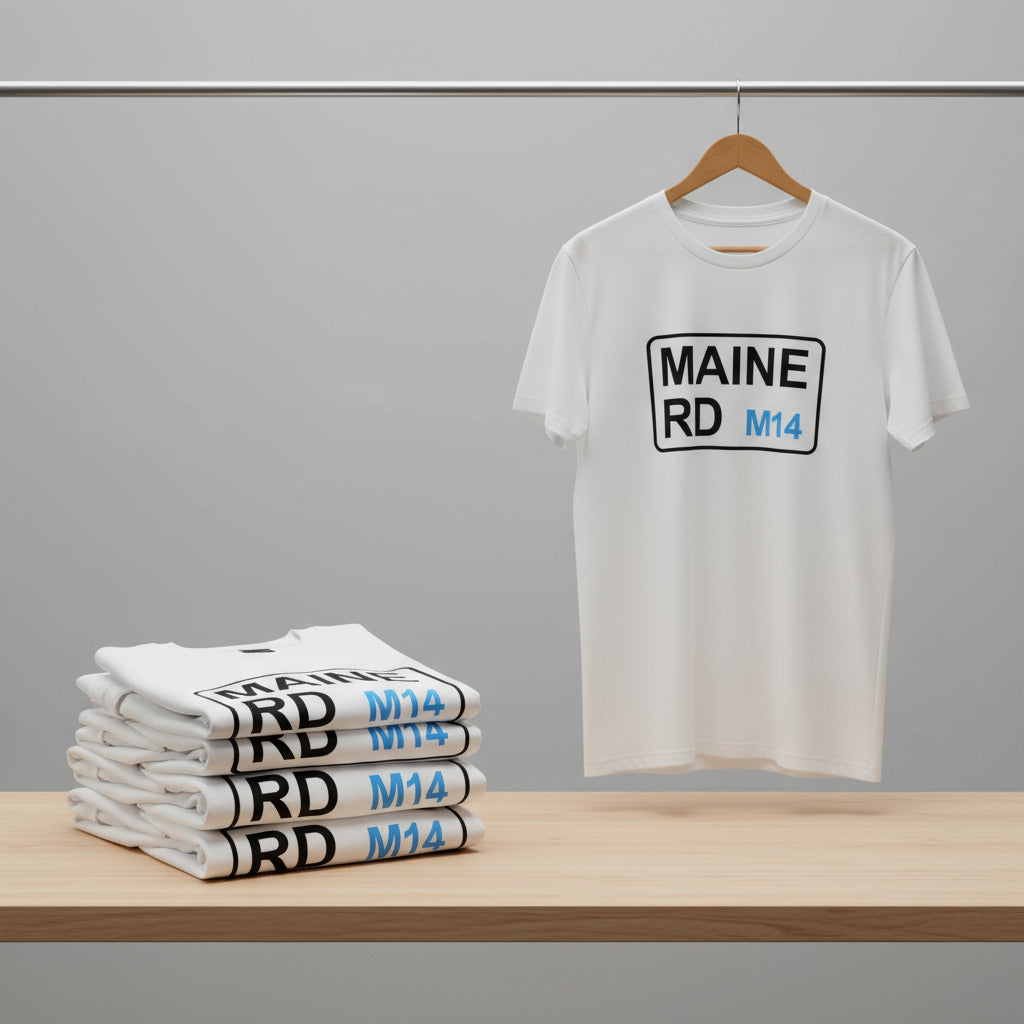 White t-shirt with 'MAINE RD M14' print on a hanger and stacked below against a grey background