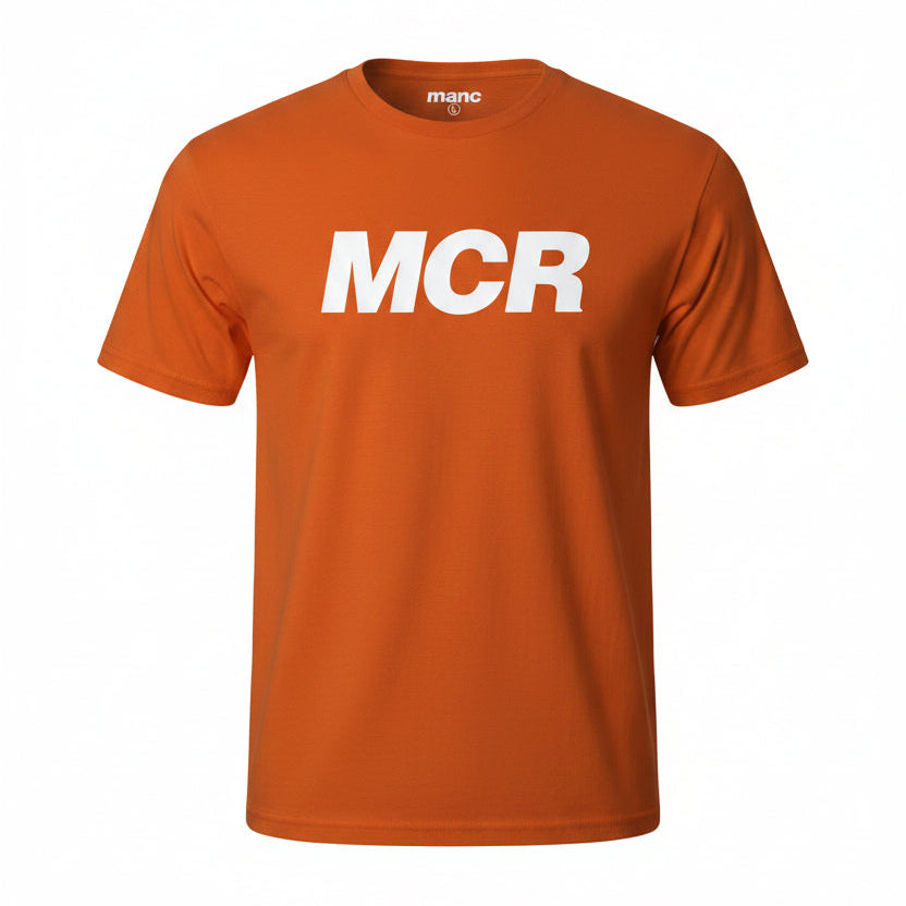 Orange t-shirt with 'MCR' printed on it against a white background