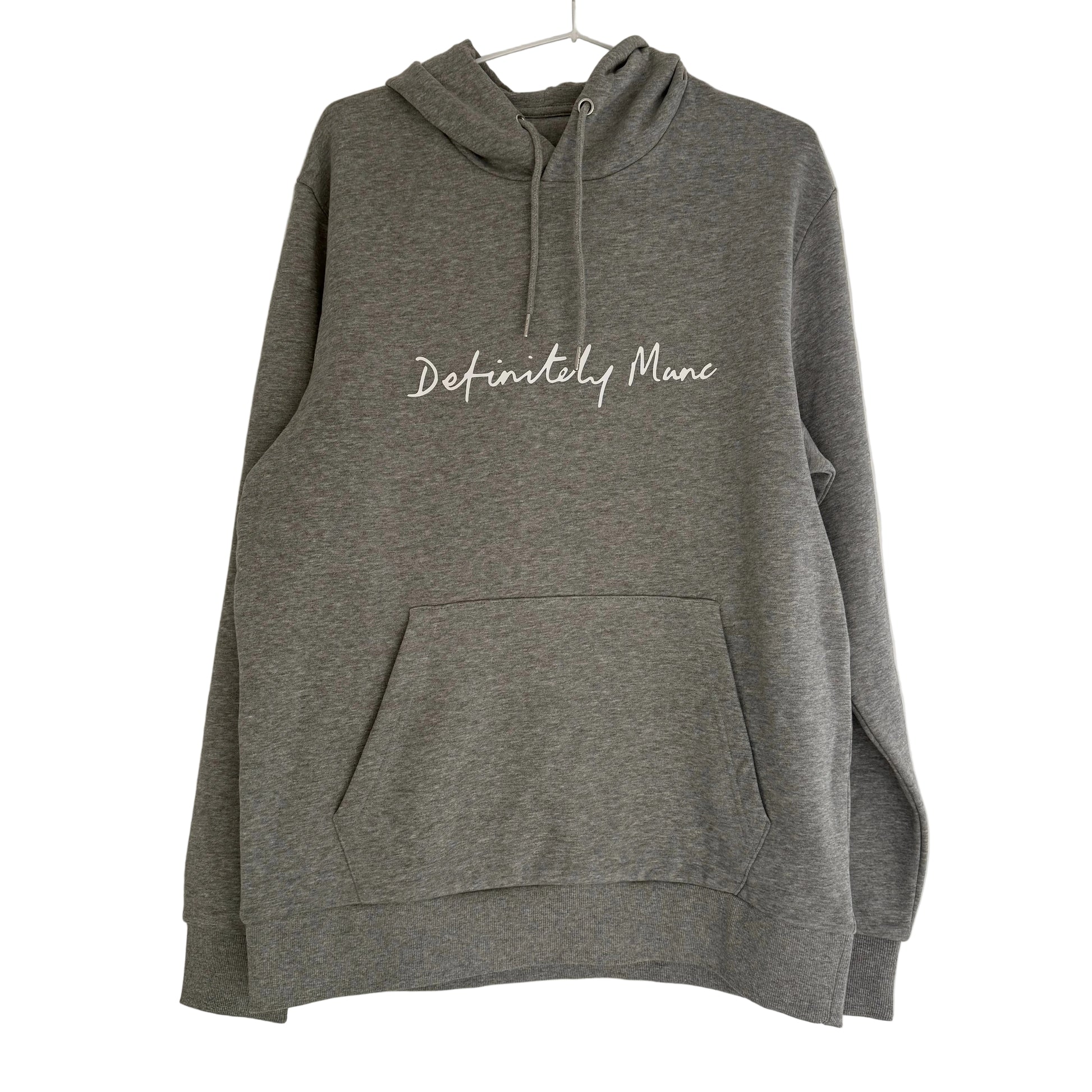 Grey hoodie with 'Definitely Manc' text on a white background