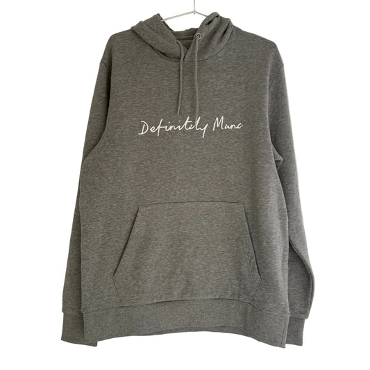 Grey hoodie with 'Definitely Manc' text on a white background