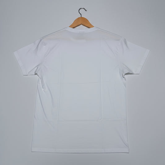 White t-shirt on a wooden hanger against a gray background