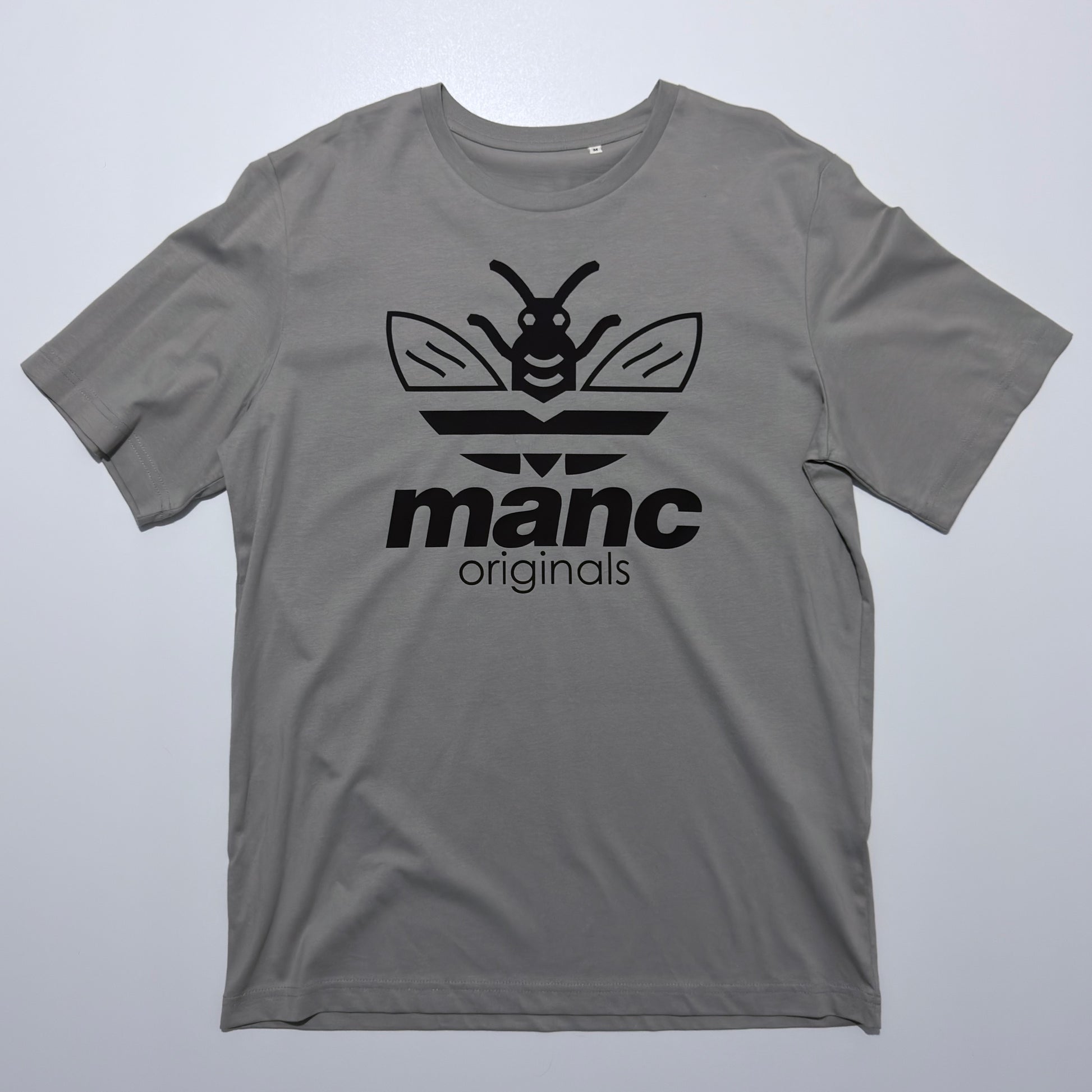 Grey t-shirt with black logo and text on a light grey background